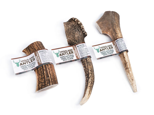 Three Highland Antler dog chew products on a white background