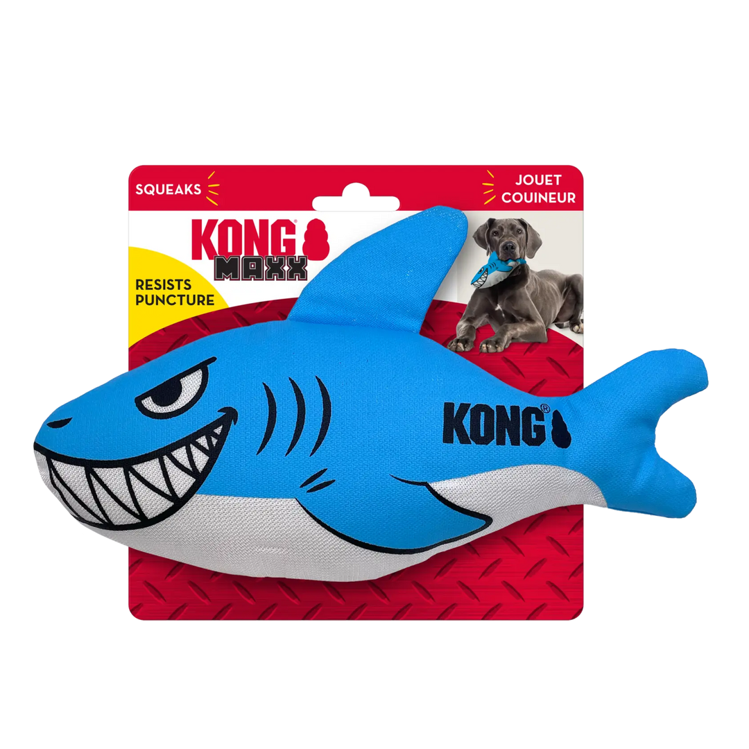Blue shark-shaped KONG toy on a red packaging background