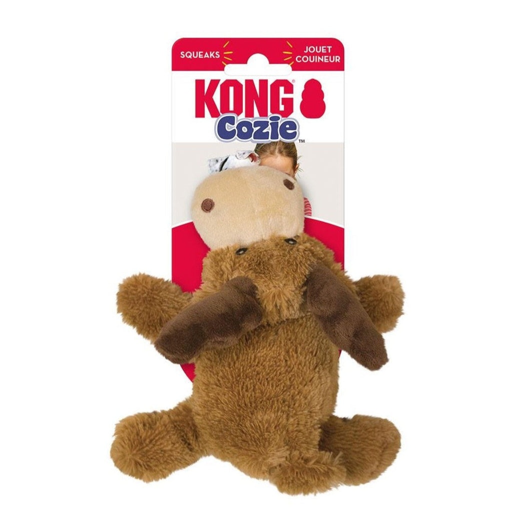 Brown plush dog toy with packaging featuring the Kong Cozie logo on a white background