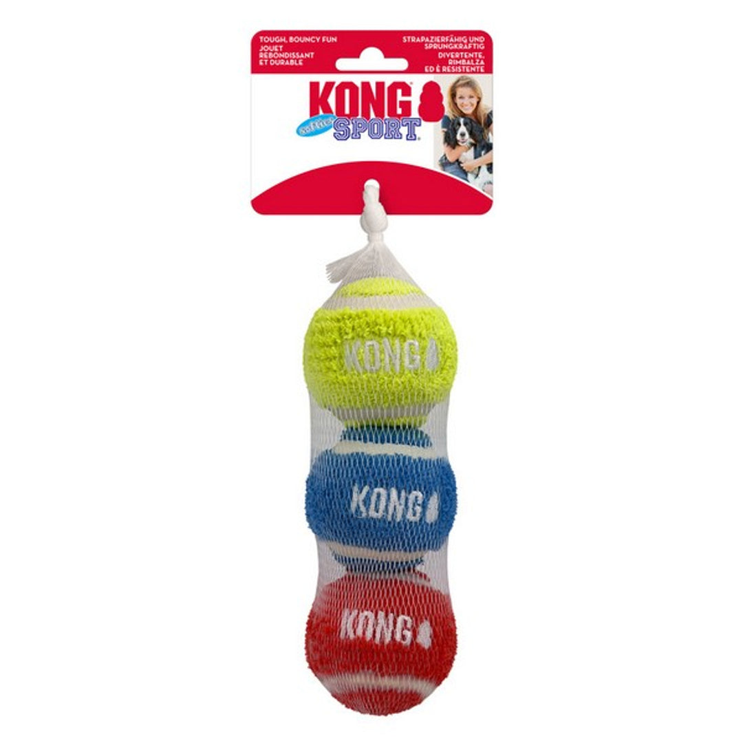 Colourful Kong  dog play balls in a net on a white background